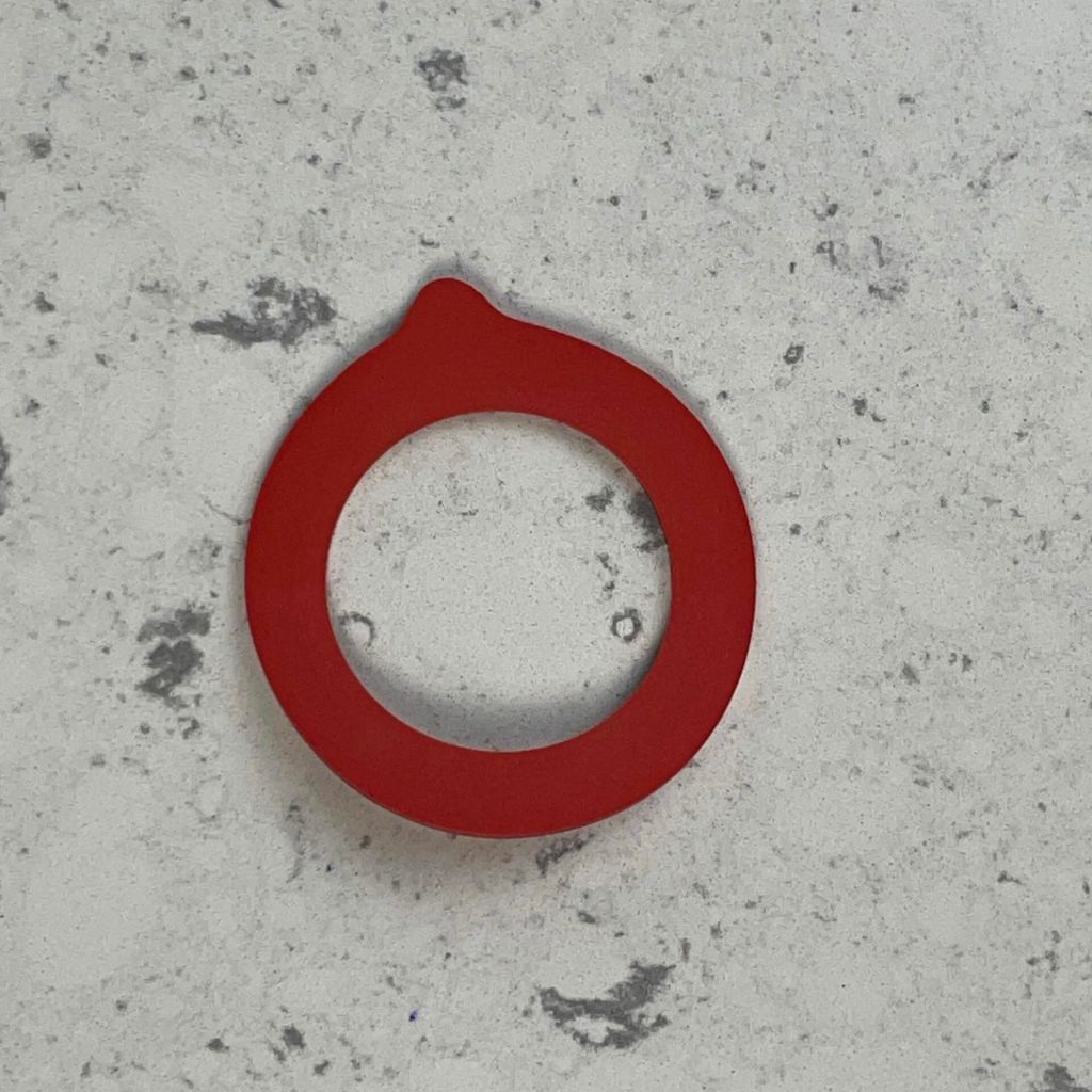 Up close red rubber replacement sealing gasket for mason jar