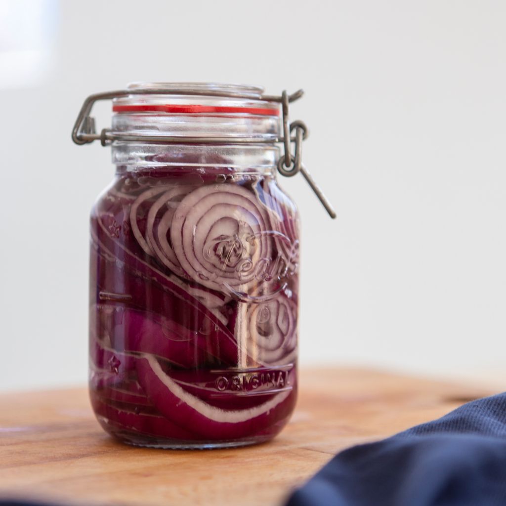 Classic swing filled with red onions for fermenting